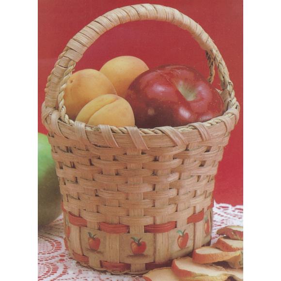 Close up of the basket with a row of printed apples at the bottom